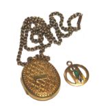 A 9 carat gold neck chain with gold colour locket, etc