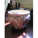 A 1930s Chinese fish bowl, with panels of flowers and fans depicting exotic birds 21cm high
