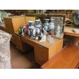 A Stag furniture light wood dressing table, with mirror back, 127cm wide, a matching chest of
