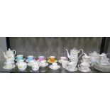 A Heathcote china Tulip pattern coffee service, a set of five polychrome Royal Grafton coffee cups