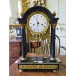 A French 19th century slate and ormolu mounted mantel clock, the dial inscribed Leonard Roussel a