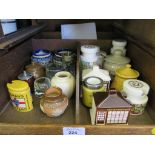 A selection of pottery mustard pots for Colman's Mustard