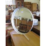 A white metal circular table mirror by Durlston designs 56cm high