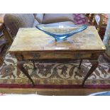 An 18th century style crossbanded walnut foldover card table, possibly Dutch, with frieze drawer