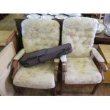 A pair of light oak upholstered easy armchairs and another pair (4)