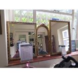 Three giltwood wall mirrors with scrolling frames (3)