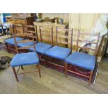 A set of six George III style mahogany ladderback chairs, the pierced shaped rails above stuffover