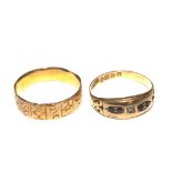An 18 carat gold wedding band with chased decoration, together with an 18 carat gold diamond and