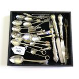 A miscellaneous collection of silver spoons, etc