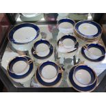 An Anchor china blue and gilt tea service for six place settings, lacks teapot and milk jug
