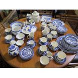 A collection of blue and white china including a Willow pattern breakfast service and other wares
