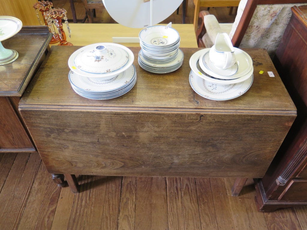 A George III mahogany gateleg table, the rectangular top on square section legs, 108cm wide