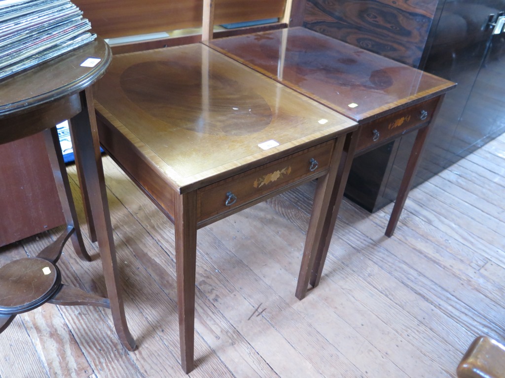 A pair of Brights of Nettlebed satinwood crossbanded mahogany side tables, the oval veneer tops over