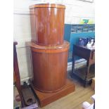 A continental Art Deco mahogany demi lune cabinet, the two stepped tiers with satinwood