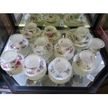 Ten Royal Albert Flowers of the Month series teacups and saucers, and other plates, as found