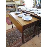 A Victorian mahogany Pembroke table, with frieze drawer, turned legs and brass castors, 97cm wide