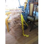 An Edwardian cast iron umbrella stand, pierced with Gothic designs 58cm high and a bamboo bird