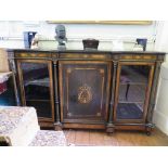 A Victorian ebonized and amboyna credenza, the central door with lyre motif inlay flanked by