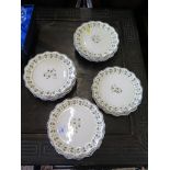 A set of nineteen Wedgwood creamware piecrust edge plates, with leaf borders 20cm diameter