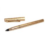 A gold plated Parker ball point pen