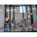 A Murano glass figure of a man drinking from a bottle, and other Murano glass figures