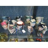 Eleven small Royal Doulton character jugs, including Merlin D6543, Gunsmith D6580, Tam O' Shanter