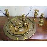Three Middle Eastern brass circular trays, a rectangular tray and various brass vases