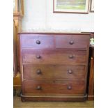 A Victorian mahogany chest of drawers, with two short and three long graduated drawers on a plinth