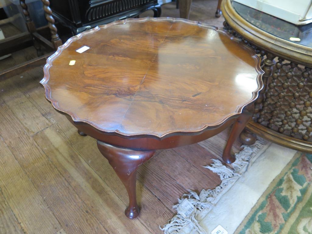 A 1930s walnut pie crust edge coffee table, 60cm diameter, a mahogany bidet and an oak barley-