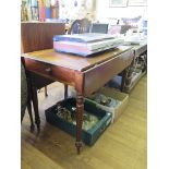 A Victorian mahogany Pembroke table, with single drawer and turned tapering legs, 108cm wide