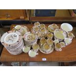 An Edwardian S. Radford China tea service with brown transfer printed decoration, fence and vase