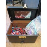 A jewellery box of necklaces, etc