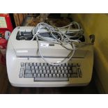 An I.B.M. golfball type electric typewriter