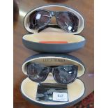 A pair of Bruce Oldfield tortoiseshell style sunglasses, and a simlar black pair by Luca Rossa, both