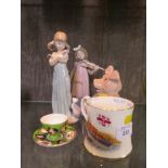 A Lladro figure of a girl with two cats no.5743 20.5cm high, a Nao figure of a girl playing the