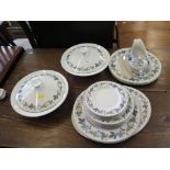 A Royal Doulton Burgundy pattern dinner service, with six place settings, sauce jug and two tureens