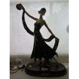 H. Santini, an Italian ceramic figure of a 1920's lady with long scarf 41cm high