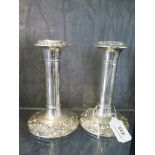 A pair of silver candlesticks, 15cm high