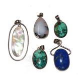 Five silver mounted stone set pendants