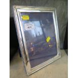 A silver photo frame 24cm x 18cm