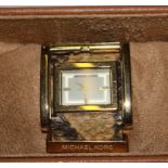 A boxed Michael Kors wristwatch