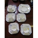 A Shelley part tea service, with blue orchid pattern, for five place settings, and bread plate