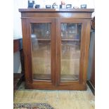 A Victorian mahogany twin glazed door bookcase 89cm wide