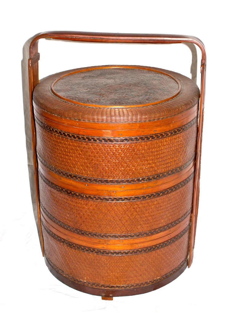 A large 20th century Chinese rattan and bamboo three sectional stacking wedding basket, 68cm high