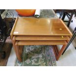 A nest of three Danish teak tables, by Vildbjerg Mobelfabrik, 62cm wide and a ceiling light, 1970s