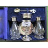 A boxed travelling communion set, silver hall mark to the bottle tops