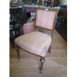 A Victorian oak and chevron inlaid dining chair, in the Gothic style, with turned top rail,