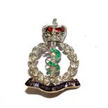 A diamond, emerald and enamel Medical Corps sweetheart brooch (two emeralds missing)