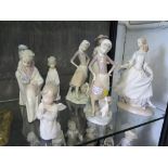 Eight Lladro figures, including three of children playing the Three Kings, and other girls