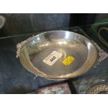 A 900 silver standard two handled dish on three feet